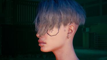 Indy's subtle face tattoo