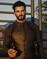 All black suit shirt and vest