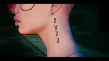 Indy's subtle face tattoo