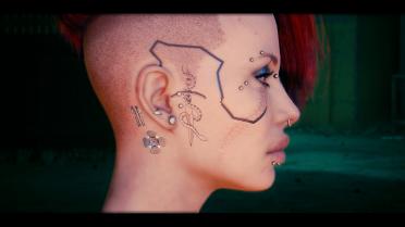 Indy's subtle face tattoo