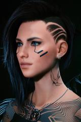 Indy's subtle face tattoo