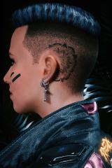 Indy's subtle face tattoo