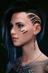 Indy's subtle face tattoo